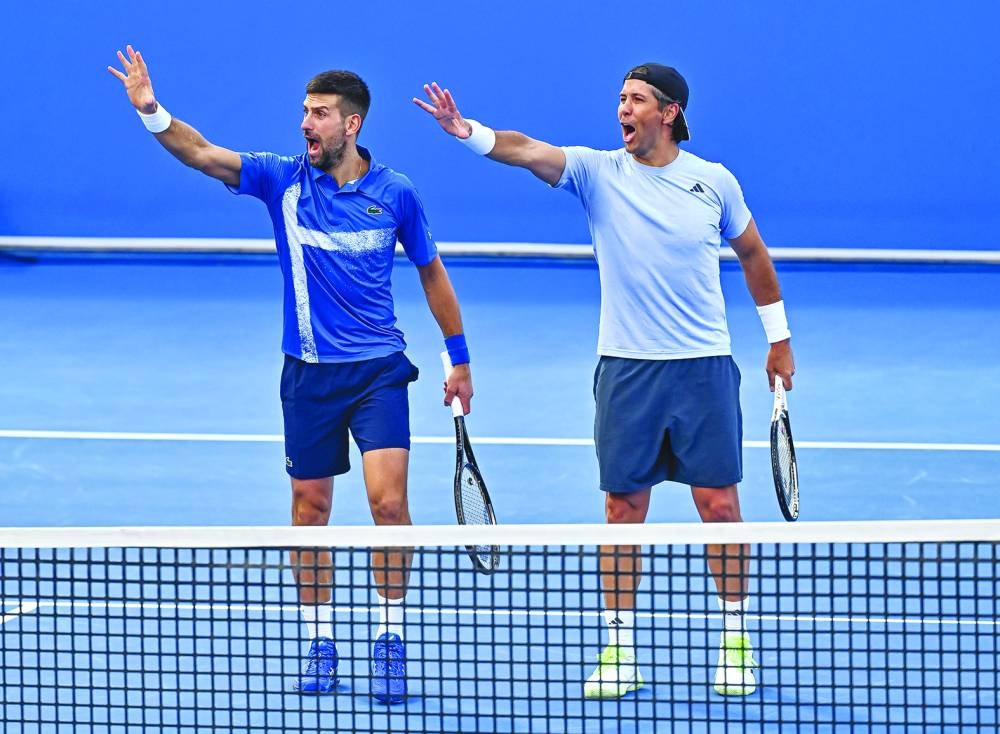 Novak Djokovic and Fernando Verdasco celebrate after winning against Alexander Bublik and Karen Khachanov. 
Picture: Noushad Thekkayil