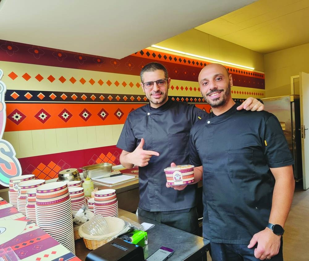 (From left) Chefs Hassan Wehbi and Mohamed Bazaza at their QIFF booth Tuesday.