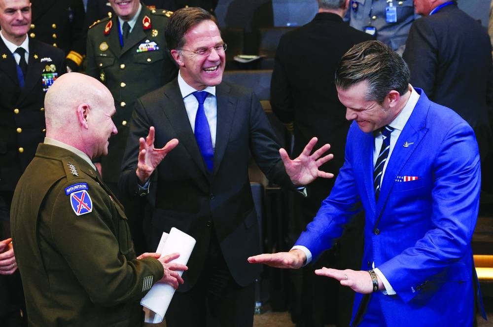 
Nato Secretary-General Mark Rutte shares a laugh with US Defence Secretary Pete Hegseth and Commander of United States European Command and Supreme Allied Commander Europe, United States Army General Christopher G Cavoli during a meeting of the North Atlantic Council during a Nato Defence Ministers meeting at the Alliance’s headquarters in Brussels last Thursday. (Reuters) 