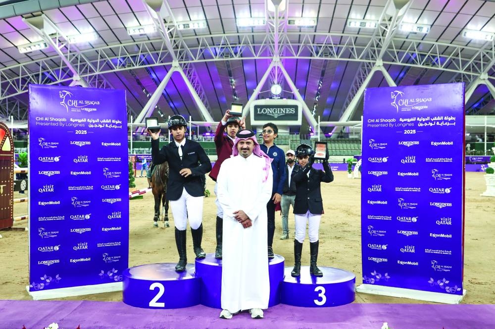 
Khalifa al-Attiyah, Executive Director of Al Shaqab poses with CSICh-B - Special Two-Phase - 1.05m class winner Abdulaziz bin Jassim al-Thani, runner-up Sharida Nasser al-Kaabi and third-placed Mohammed Hamza al-Kuwari. 