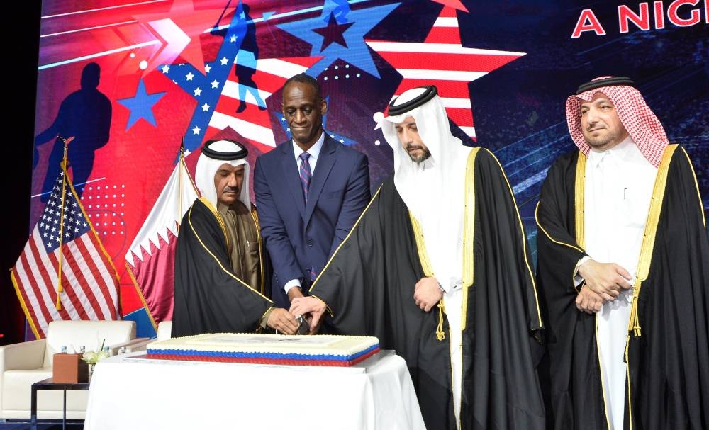 US ambassador Timmy Davis is joined by HE Dr Ahmad Hassen al-Hammadi and HE Mansoor bin Ebrahim al-Mahmoud in cutting a ceremonial cake at the celebration yesterday, as HE ambassador Ibrahim Youssef Fakhro looks on. PICTURES: Shaji Kayamkulam.