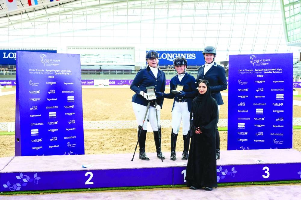 
Para dressage podium winners pose with Nouf al-Mansour, Deputy Sports Director. 