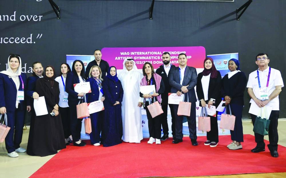 
Qatar Gymnastics Federation President Ali al-Hitmi poses with other officials after the conclusion of Qatar International Friendship Artistic Gymnastics Championship. 
