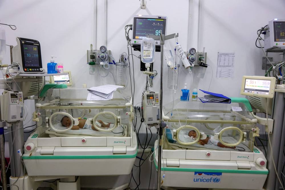 Prematurely-born infants lie in incubators at the neonatal intensive care unit (NICU) at the Patient Friend's Benevolent Society hospital in Gaza City on Tuesday. AFP