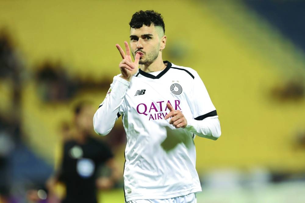 Al Sadd’s Rafa Mujica celebrates after completing his hat-trick against Al Gharafa 4-0 at the Thani Bin Jassim Stadium on Thursday.