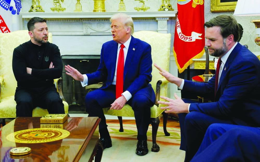 President Donald Trump meets with Ukrainian President Volodymyr Zelenskiy as Vice-President JD Vance reacts at the White House in Washington, DC, yesterday.