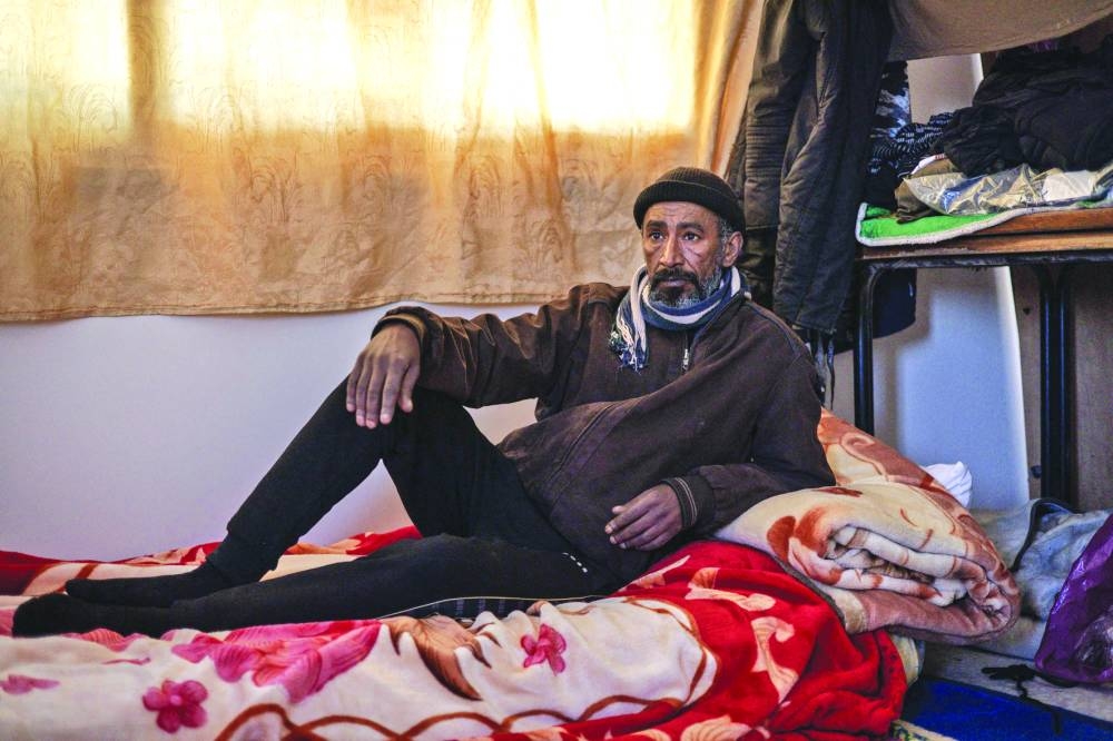 Nazmi Turkman, 53, who was recently displaced from the Jenin refugee camp, who claims to have been shot twice in 2002 and imprisoned for five years, poses for a portrait in a his inside a community centre in the occupied West Bank city of Jenin.