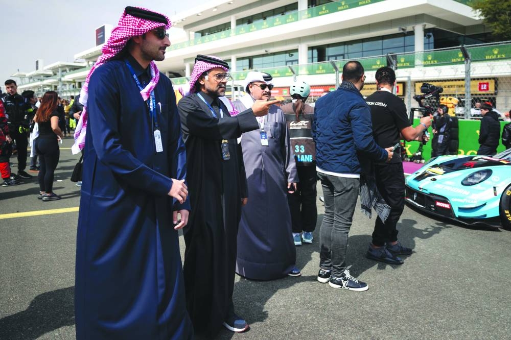 
Qatar Motor & Motorcycle Federation and Lusail International Circuit (LIC) President Abdulrahman bin Abdullatif al-Mannai and LIC CEO Abdulaziz Ali al-Mohannadi at the grid walk before the start of the Qatar 1812km race. 
