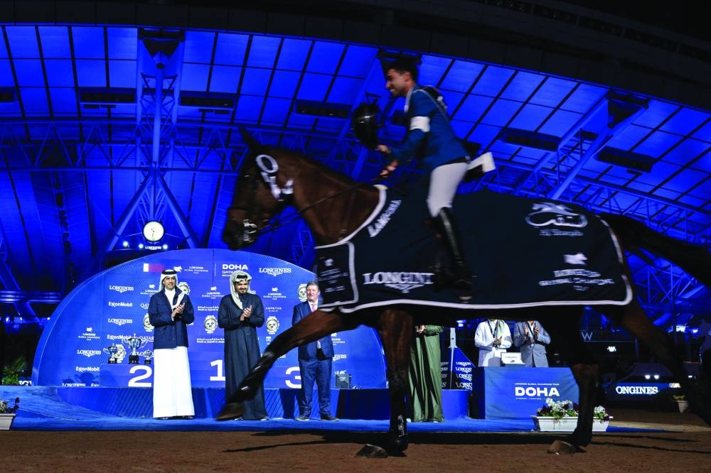 
Belgium’s Abdel Said, astride 12-year-old bay mare Bonne Amie, celebrates after winning the Global Champions Tour Grand Prix Doha 1.60m title.
 