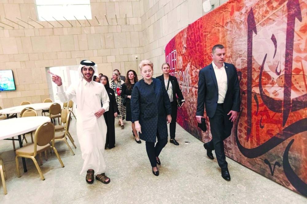 Ghanim al-Kubaisi with Former president of Lithuania Dalia Grybauskaitė (centre).