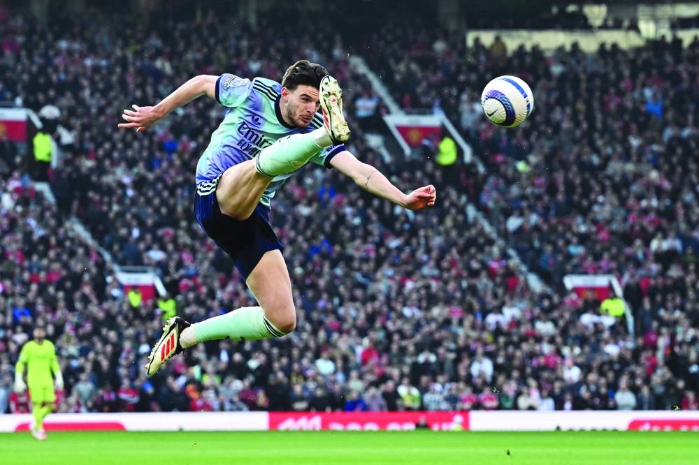 
Arsenal’s Declan Rice controls the ball during the Premier League match against Manchester United at Old Trafford in Manchester yesterday. (AFP) 