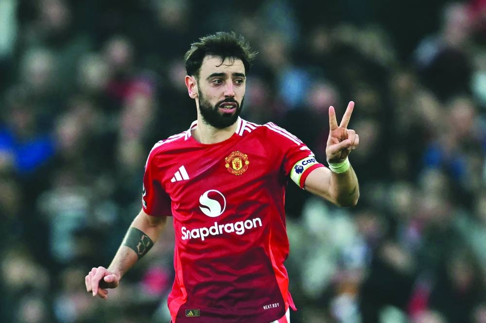 
Manchester United’s Bruno Fernandes celebrates after scoring the goal against Arsenal yesterday. (AFP) 
