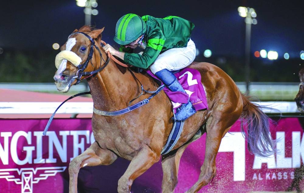 
Connections of Maysara celebrate after the mare won the Al Mamoura Cup at Al Rayyan Racecourse. 