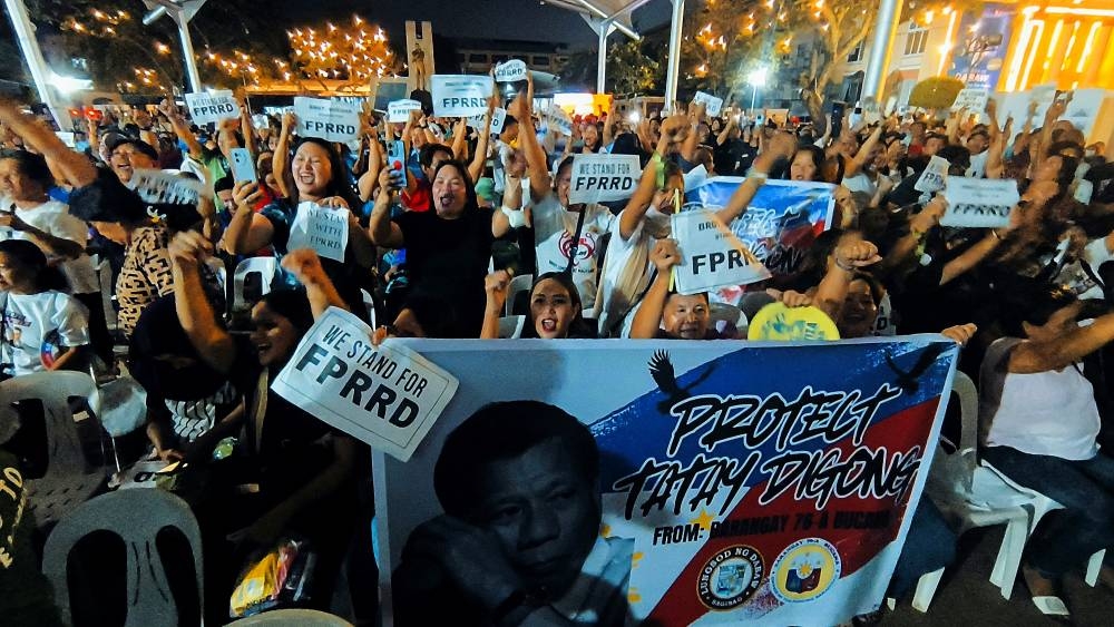 Supporters of former Philippine President Rodrigo Duterte protest after his arrest, in Davao City, on Tuesday. REUTERS