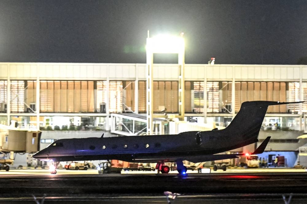 The Learjet that will carry former Philippine president Rodrigo Duterte, is pictured on the runway at Villamor Air Base in Pasay, Metro Manila, on Tuesday. AFP