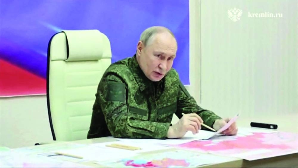 Russia's President Vladimir Putin visits a command point for the Kursk group of troops in the Kursk region, Wednesday.