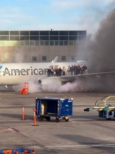 American Airlines jet engine catches fire after landing in Denver