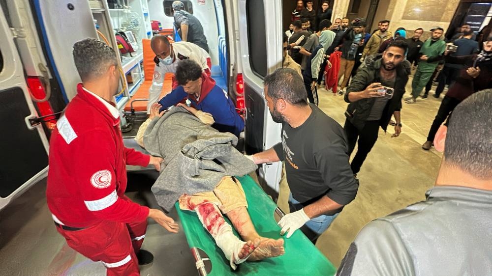A Palestinian casualty is brought to Nasser hospital following Israeli strikes, in Khan Younis in the southern Gaza Strip, on Tuesday. REUTERS