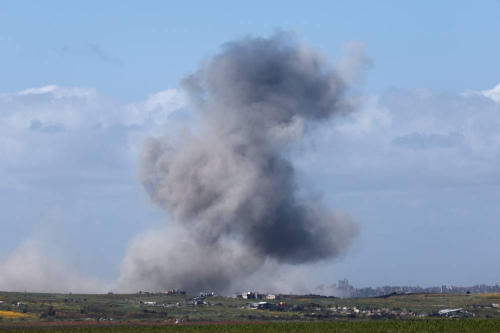 Smoke billowing after Israeli bombardment in northern Gaza, on Wednesday. AFP
