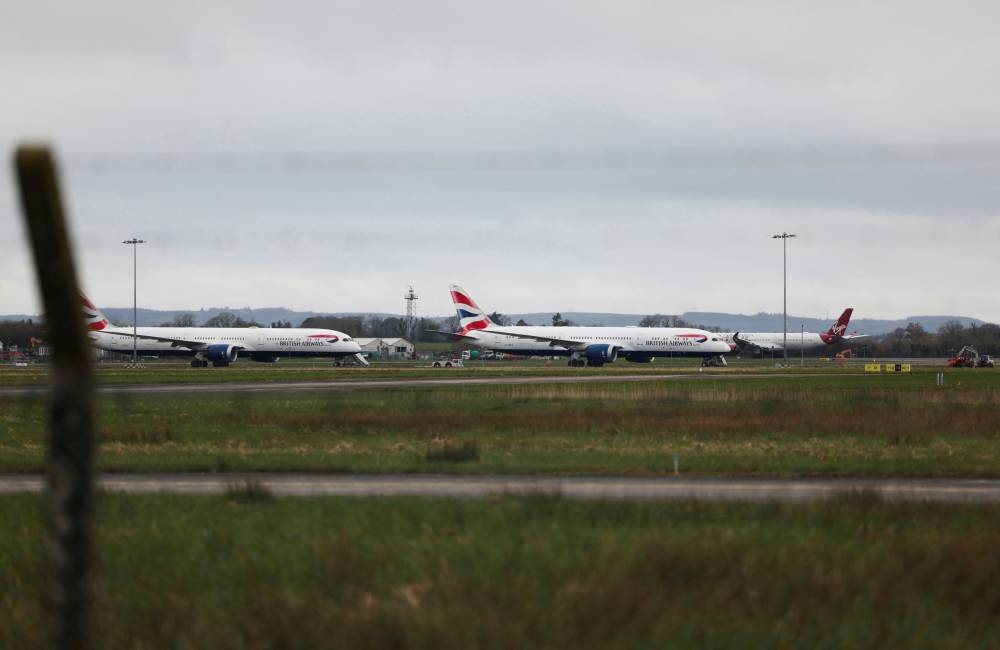 British Airways planes waits for the take off at Shannon Airport as the airport accepted diverted flights following an electrical substation fire that wiped out the power at Heathrow Airport, in Shannon, Ireland, on Saturday. REUTERS