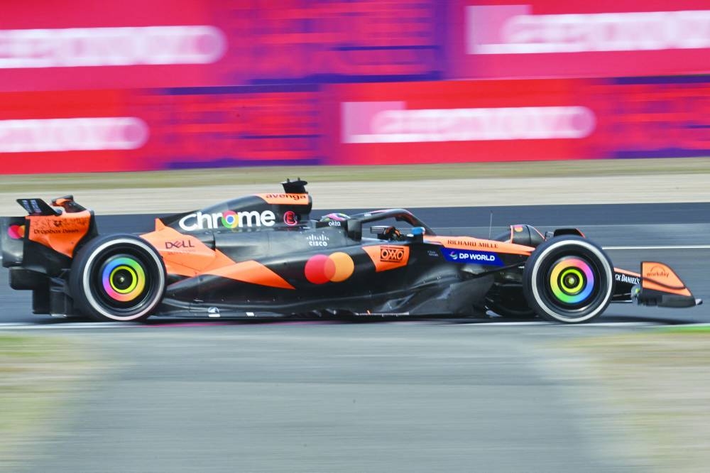 
McLaren’s Australian driver Oscar Piastri drives during the Chinese Grand Prix at the Shanghai International Circuit in Shanghai yesterday. (AFP) 