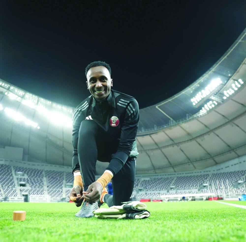 
Qatar goalkeeper Meshaal Barsham smiles during a training session in Doha yesterday. 