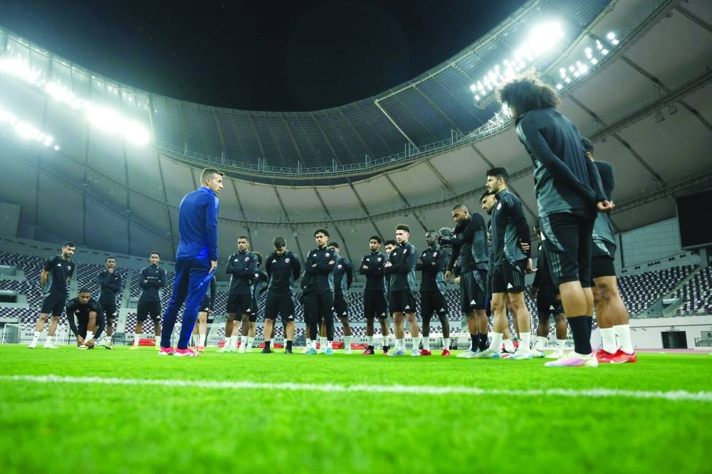 
Qatar coach Luis Garcia addresses players ahead of a team training session in Doha yesterday. Qatar is set to fly to Kyrgyzstan for their next 2026 FIFA World Cup Asian Zone qualifying match to be played tomorrow. (@QFA) 