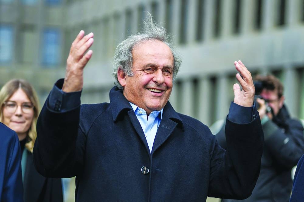 Former UEFA president Michel Platini reacts when leaving the courthouse after the verdict in Muttenz near Basel, on Tuesday. (AFP)