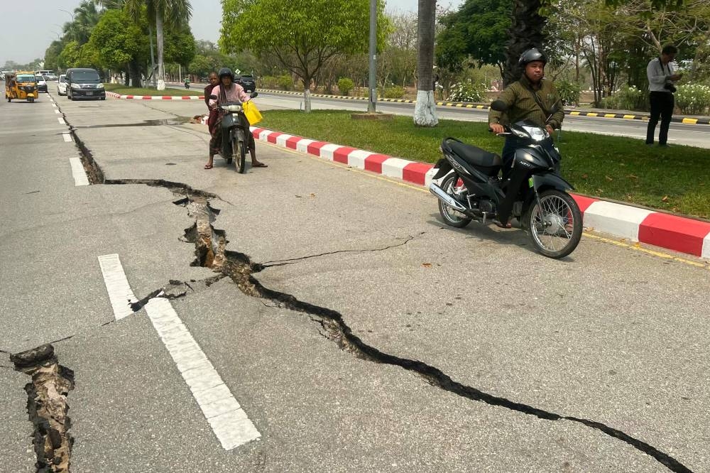 Cracks are seen on a road in Naypyidaw, after an earthquake in central Myanmar. A powerful earthquake rocked central Myanmar, on Friday. AFP