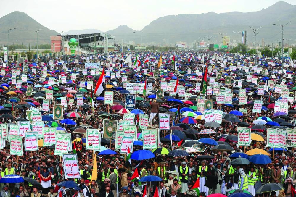 Supporters of Yemen's Houthi fighter attend a gathering to mark annual Quds (Jerusalem) Day commemorations in Sanaa, yesterday.