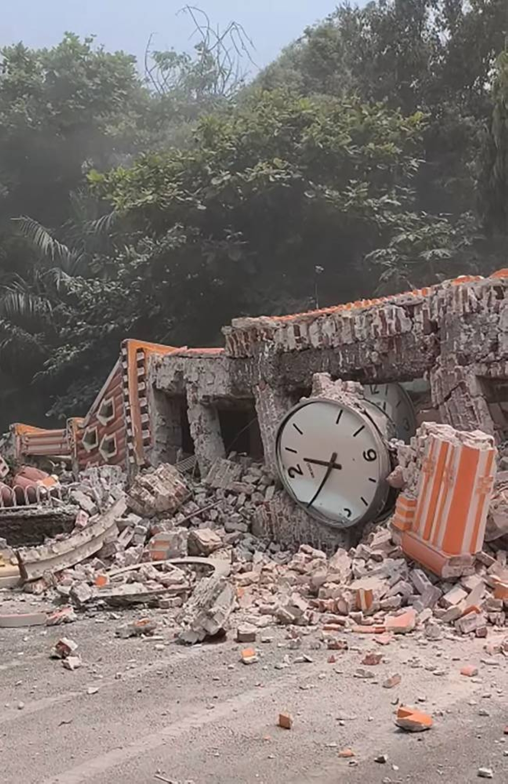 
This frame grab from UGC video footage taken and posted by Ashin Tikkhanyarna Linkara on Facebook on March 28, 2025 shows a destroyed clock tower near the Ma Soe Yein monastery in Mandalay, following an earthquake. AFP /Courtesy of Facebook user Ashin Tikkhanyarna Linkara