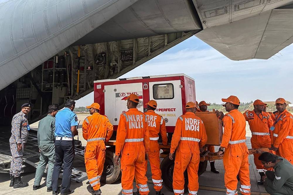 National Disaster Response Force (NDRF) personnel loading relief materials in an Indian Air Force (IAF) aircraft following an earthquake in Myanmar, at the Hindon Airbase station in Ghaziabad. An Indian aid flight landed in Myanmar on Saturday, the foreign ministry in New Delhi said, a day after a powerful 7.7-magnitude caused widespread damage in its civil war-ravaged neighbour. AFP /External Publicity and Public Diplomacy Division of India's Ministry of External Affairs.