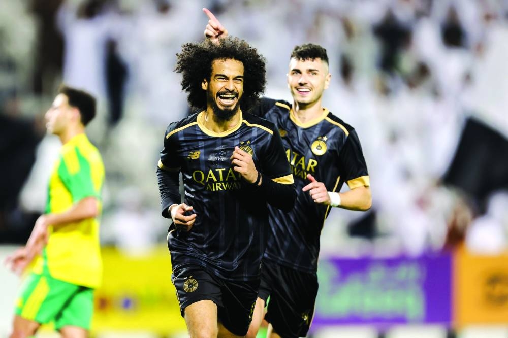 
Al Sadd’s Akram Afif celebrates after scoring a goal against Al Wakrah. 