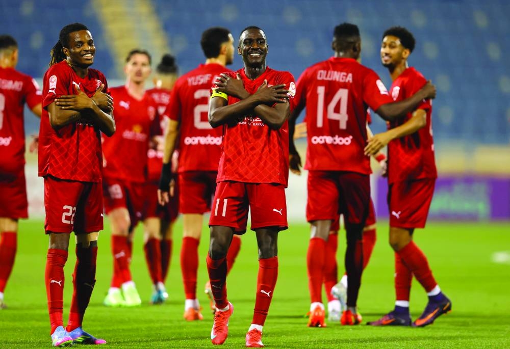 
Al Duhail players celebrate their 2-0 victory over Al Gharafa on Saturday. 