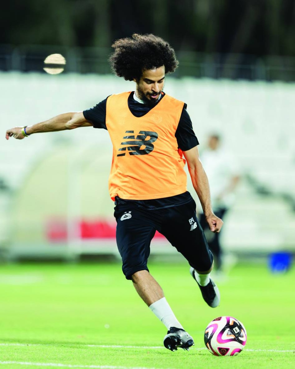 Al Sadd’s Akram Afif (left) seen during a separate training session ahead of Round 21 matches in the Qatar Stars League (QSL). There are six QSL matches scheduled for on Friday.
