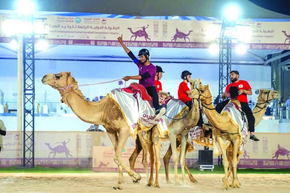 
A Qatari player rejoices after scoring against Lebanon at Libsear racetracks at Al Shahaniya. 