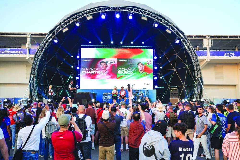 
LCR Honda’s riders Johann Zarco and Somkiat Chantra at the Fan Zone, which was alive with crowds joining in various activities. 