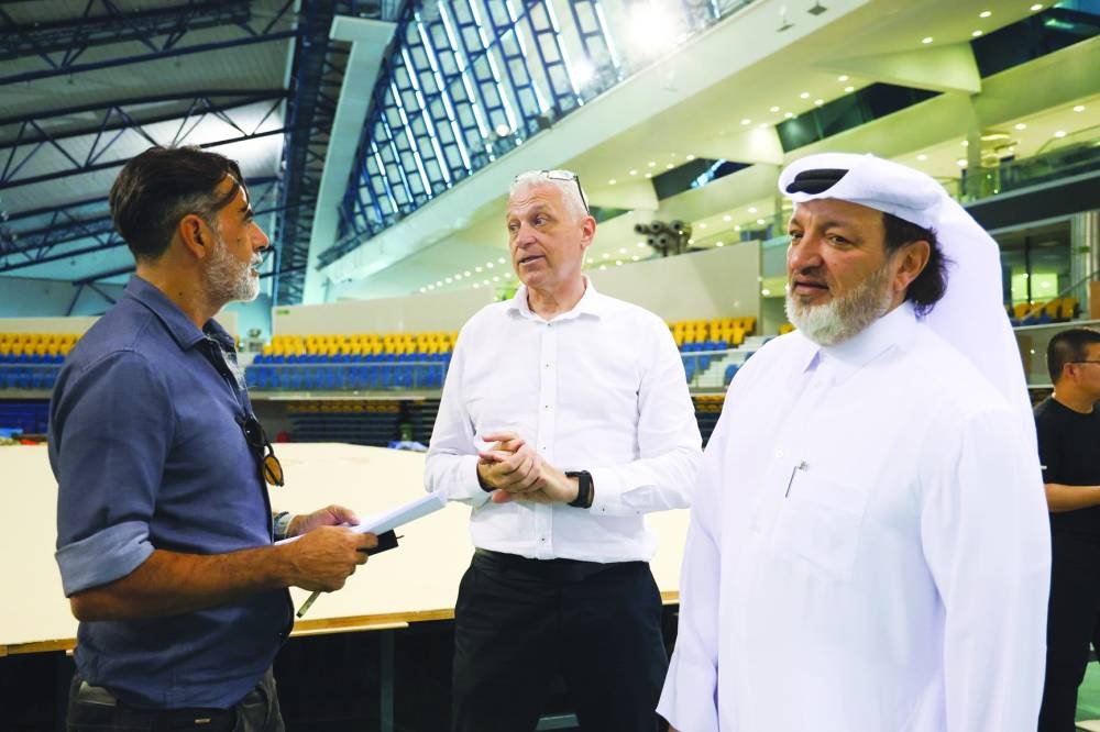 
Ali al-Hitmi, President of the Qatar Gymnastics Federation, talks to his committee members. 
 