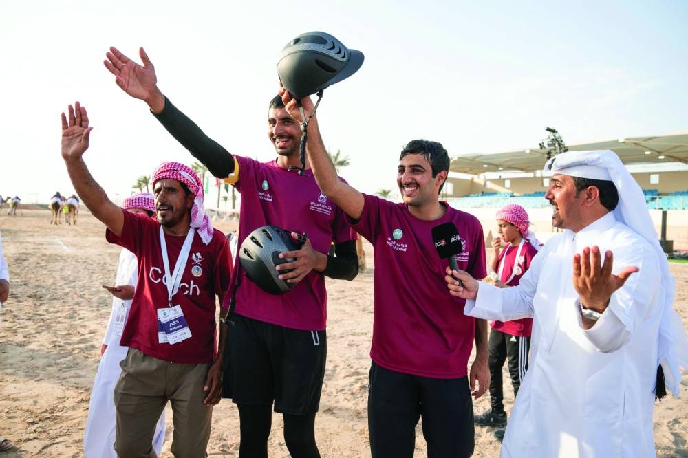 Qatar camel handball squad celebrate after their win over Morocco in the semi-finals on Sunday.