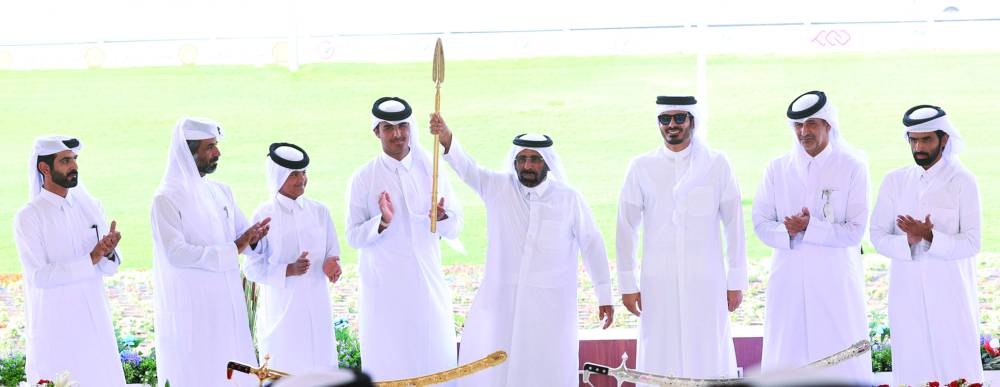 HE the Minister of Interior and Commander of the Internal Security Force (Lekhwiya), Sheikh Khalifa bin Hamad bin Khalifa al-Thani crowned the winners at the grand finale of the annual Purebred Arabian Camel Racing Festival for the sword of His Highness the Amir Sheikh Tamim bin Hamad al-Thani at the Al Shahaniya Camel Racetrack on Tuesday.