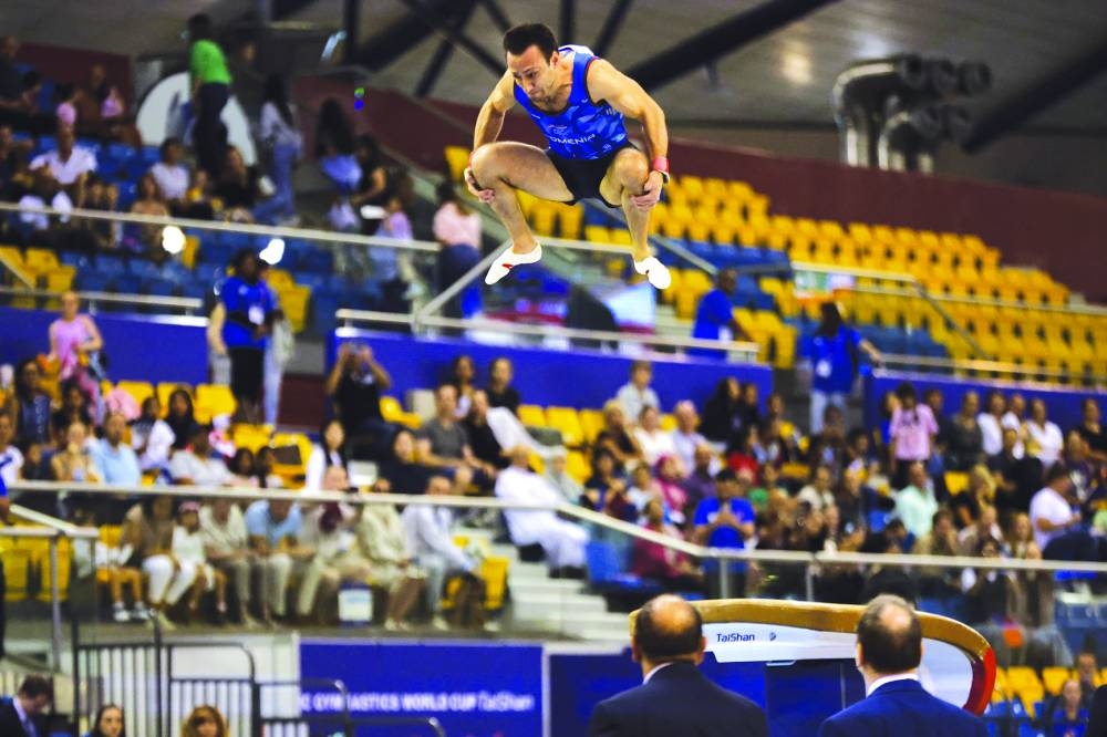 
Gymnasts in action during the final day’s proceedings at the 17th FIG Artistic Gymnastics World Cup in Doha. 
 