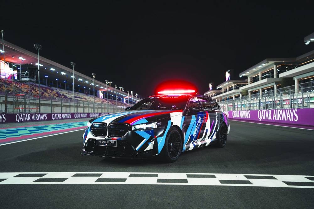 
Safety Car BMW M5 Touring takes centre stage at the Paddock main entrance.
 