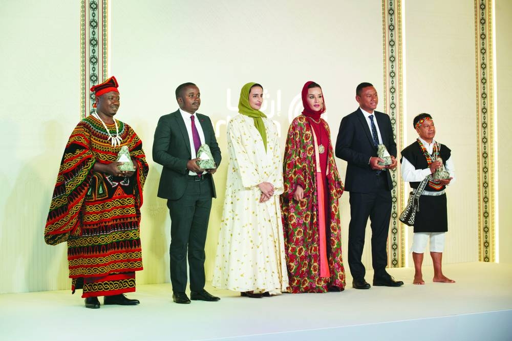 PAGE ONE PIC - Her Highness Sheikha Moza bint Nasser and HE Sheikha Hind bint Hamad al-Thani, along with Earthna Prize winners at Earthna Summit 2025, on Tuesday. PICTURE: AR Al-Baker.