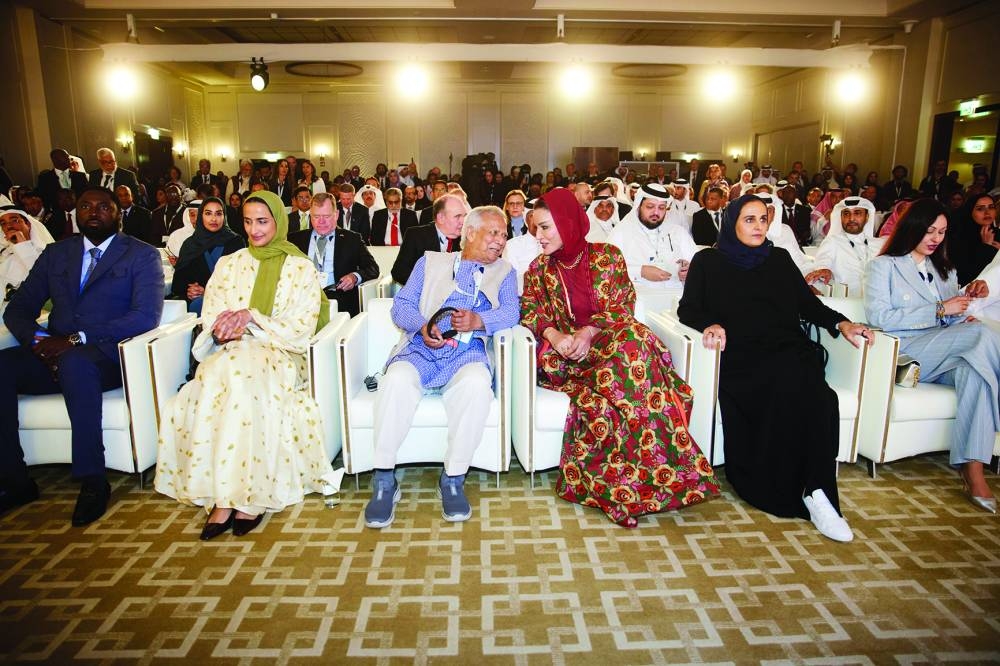 BACK PAGE PIC - Her Highness Sheikha Moza bint Nasser, HE Sheikha Hind bint Hamad al-Thani, HE Sheikha Al Mayassa bint Hamad bin Khalifa al-Thani, Chief Adviser of the Interim Government of Bangladesh Dr Muhammad Yunus and other dignitaries at the Earthna Summit 2025 opening on Tuesday. PICTURE: Aisha Al-Musallam