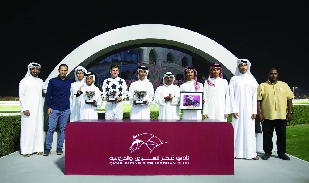 Connections of Toromona celebrate after the bay gelding won the Al Jassasiya Cup at the Al Rayyan Racecourse on Tuesday.