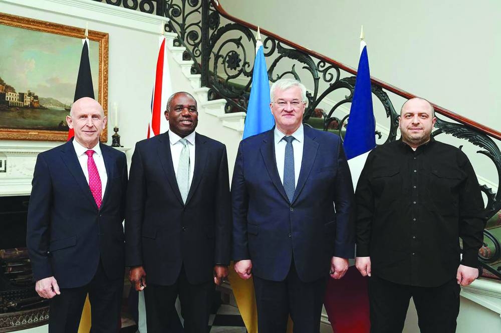 (From L) Britain's Defence Secretary John Healey, Britain's Foreign Secretary David Lammy, Ukraine's Minister of Foreign Affairs Andriy Sybiga, Ukraine's Defence Minister Rustem Umerov posing during their meeting in London on Wednesday 