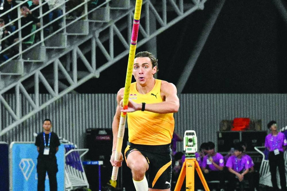 Sweden’s Armand Duplantis competes in the men’s pole vault event in Xiamen on Saturday. (AFP)
