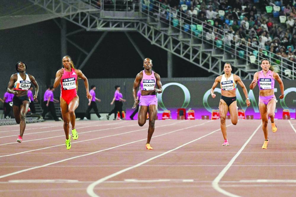 
(L-R) Ivory Coast’s Jessika Gbai, US’ Anavia Battle and Jamaica’s Shericka Jackson, Switzerland’s Mujinga Kambundji and US’ Jenna Prandini compete in the women’s 200m event in Xiamen. (AFP) 