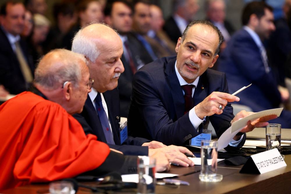 Ammar Hijazi, ambassador and permanent Palestinian representative to international organizations in the Netherlands, speaks on the day of a hearing at The International Court of Justice (ICJ) in the ongoing case regarding Israel's occupation of Palestinian territories, in The Hague, Netherlands, on Monday. REUTERS