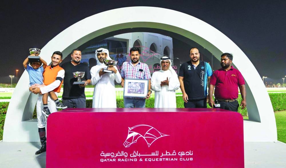 Connection of Mutamarrid celebrate with trophies PICTURE: Juhaim